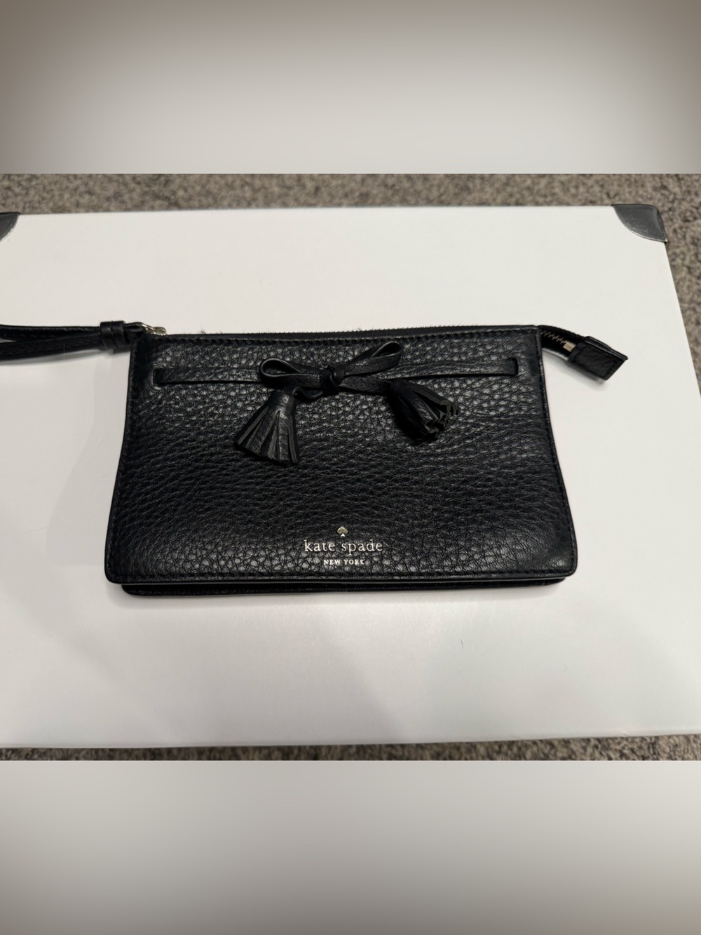 Kate Spade New York Black Pebbled Leather Bow Tassel Wristlet Clutch
